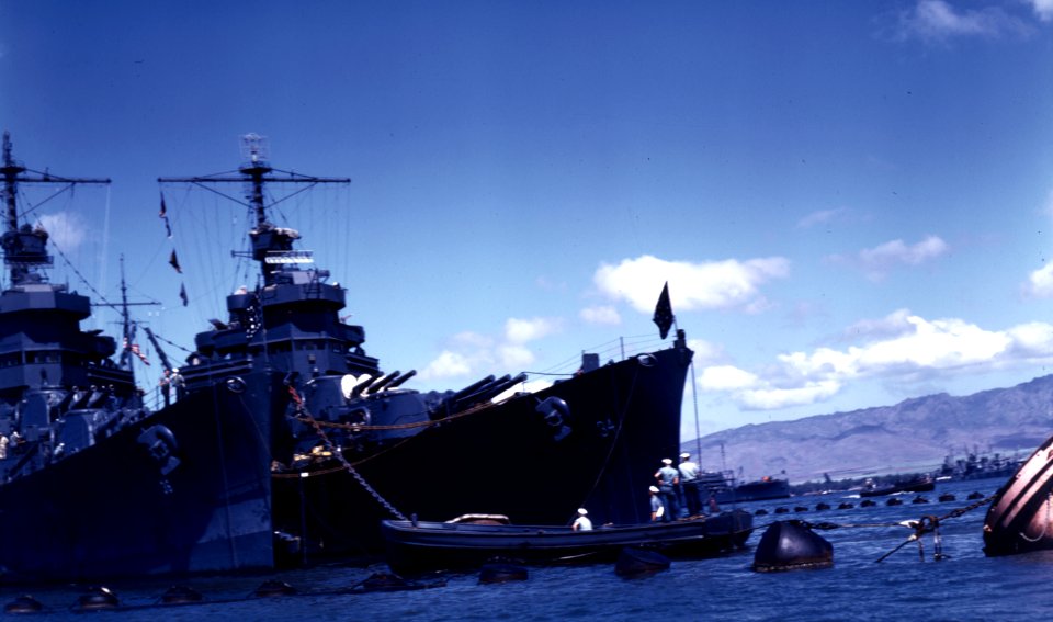 USS Astoria (CA-34) and USS Minneapolis (CA-36) moored in Pearl Harbor, Hawaii, in late June 1942 (80-G-K-452)