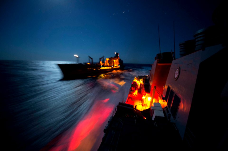 USS Carney (DDG-64) breaking away from USNS Big Horn (T-AO-198) after night underway replenishment in the Mediterranean 160814-N-ZE250-217