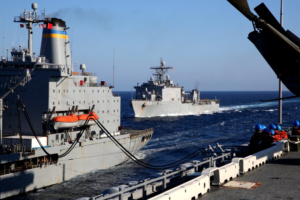USS Carter Hall approaches USNS Leroy Grumman. (8434690133)