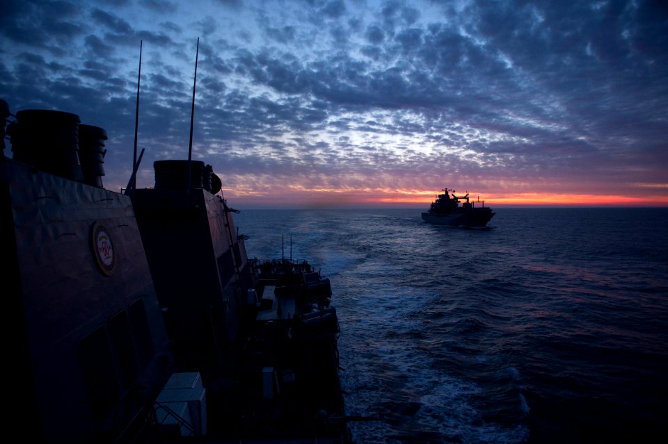 USS Carney (DDG-64) pulling away from Bonn (A1413) during Joint Warrior 17-1 170327-N-ZE250-360