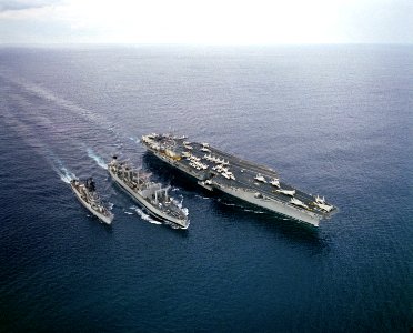 USS Caloosahatchee (AO-98) refueling USS Dwight D. Eisenhower (CVN-69) and USS Manley (DD-940), circa in the early 1980s (6392693)