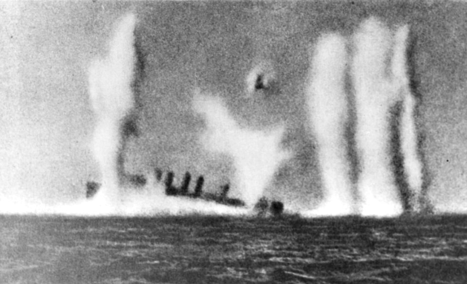 USS Edsall (DD-219) under fire and sinking on 1 March 1942 (80-G-178997)