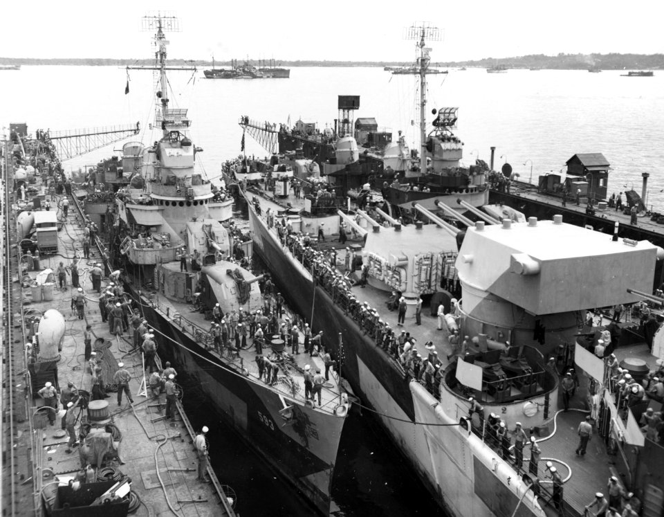 USS Claxton (DD-571), USS Canberra (CA-70) and USS Killen (DD-593) in floating dry dock ABSD-2 at Manus, 2 December 1944 (80-G-304096)