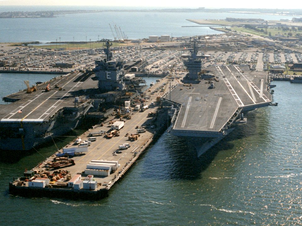 USS Enterprise (CVN-65) and USS Abraham Lincoln (CVN-72) tied up at Naval Station Norfolk on 25 September 1990 (6463991)