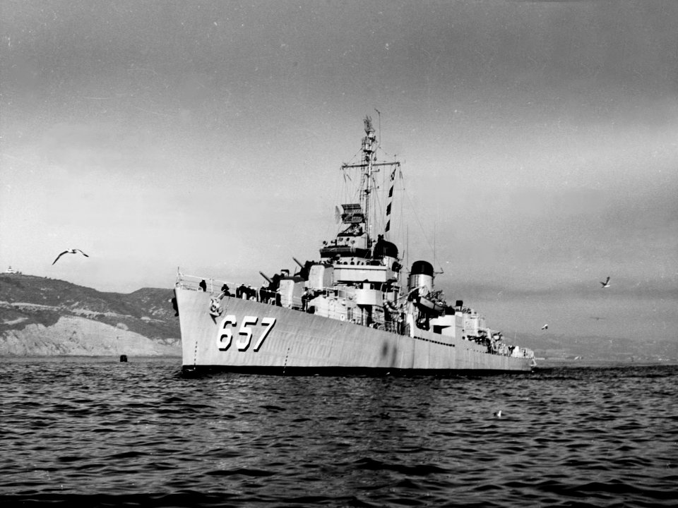 USS Charles J. Badger (DD-657) underway, circa in 1951 (NH 107201)