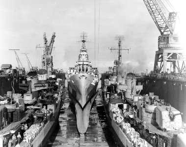 USS Claxton (DD-571), USS Canberra (CA-70) and USS Killen (DD-593) in floating dry dock ABSD-2 on 2 December 1944 (80-G-304088)