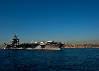 USS Enterprise (CVN-65) anchored off Naples on last deployment (121019-N-FI736-010)