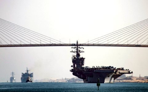 USS Dwight D. Eisenhower (CVN-69) passing under Suez Canal Bridge ahead of USNS Arctic (T-AOE-8) and USS Nitze (DDG-94) (160708-N-OR652-345)