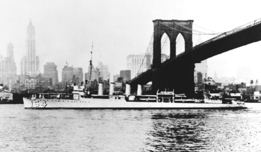 USS Ellis (DD-154) passing under the Brooklyn Bridge in the 1930s