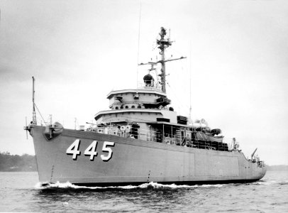 USS Force (MSO-445) underway in December 1954 photo