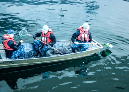 USS George Washington sailors collect debris 150119-N-DE001-017