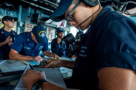 USS Germantown departs White Beach 141022-N-XM324-033