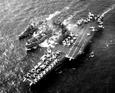 USS Graffias (AF-29) replenishes USS Coral Sea (CVA-43) and USS Marshall (DD-676) in November 1963