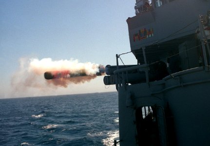 USS Goldsborough (DDG-20) fires a Mark 46 torpedo from a Mark 32 torpedo tube, in 1990 (6476074) photo