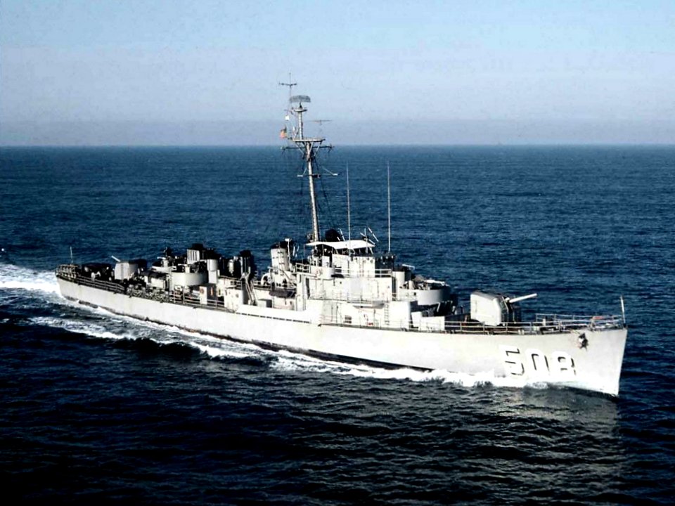 USS Gilligan (DE-508) underway at sea, in the 1950s