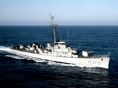 USS Gilligan (DE-508) underway at sea, in the 1950s