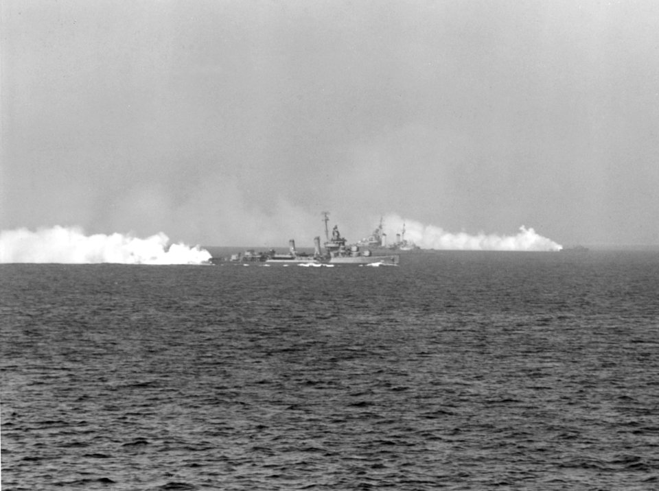 USS Gleaves (DD-423) laying smoke during the invasion of Southern France on 18 August 1944