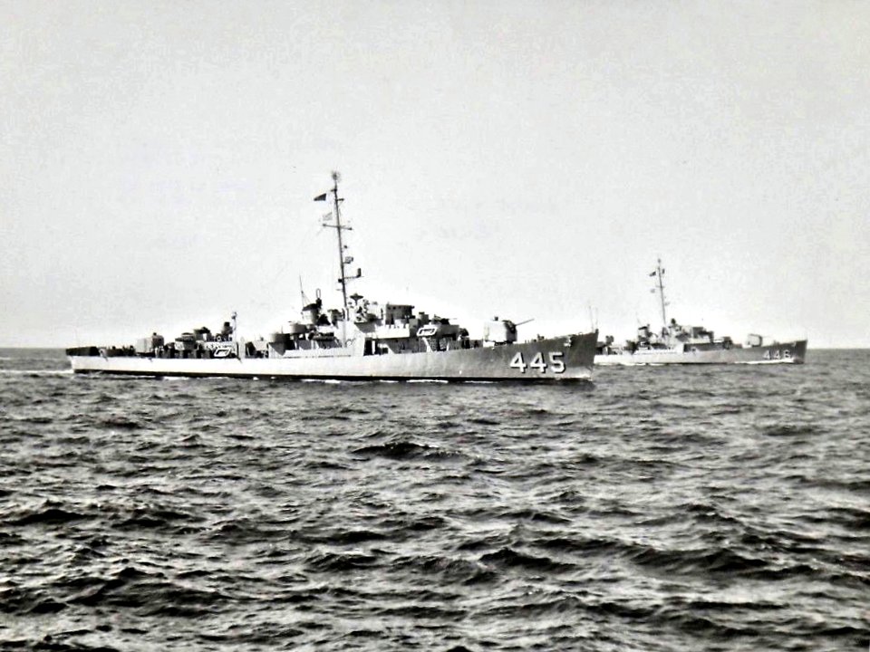 USS Grady (DE-445) and USS Charles E. Brannon (DE-446) underway in the Pacific Ocean, in the 1950s