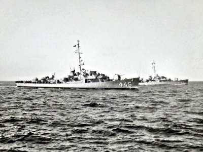 USS Grady (DE-445) and USS Charles E. Brannon (DE-446) underway in the Pacific Ocean, in the 1950s