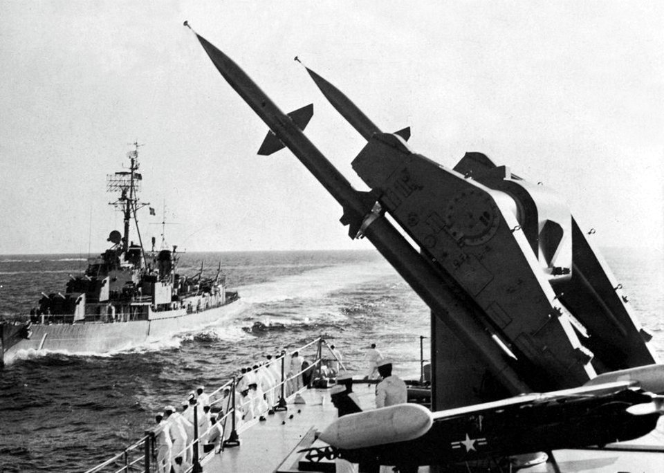 USS Gyatt (DDG-1) comes alongside of USS Boston (CAG-1), in 1960