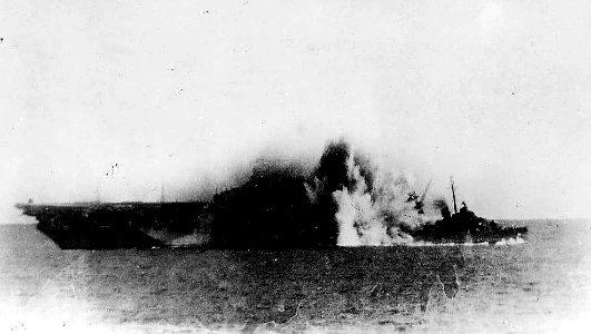 USS Halsey Powell (DD-686) hit by kamikaze alongside USS Hancock (CV-19) in 1945