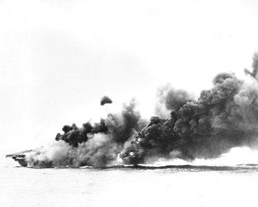 USS Hancock (CV-19) burning after kamikaze hit in April 1945