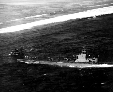 USS Harder (SS-257) rescueing pilot at Woleai 1944
