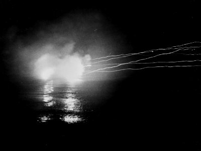 USS Helena (CL-50) firing during the Munda-Vila Bombardment, 13 May 1943 (NH 76496)