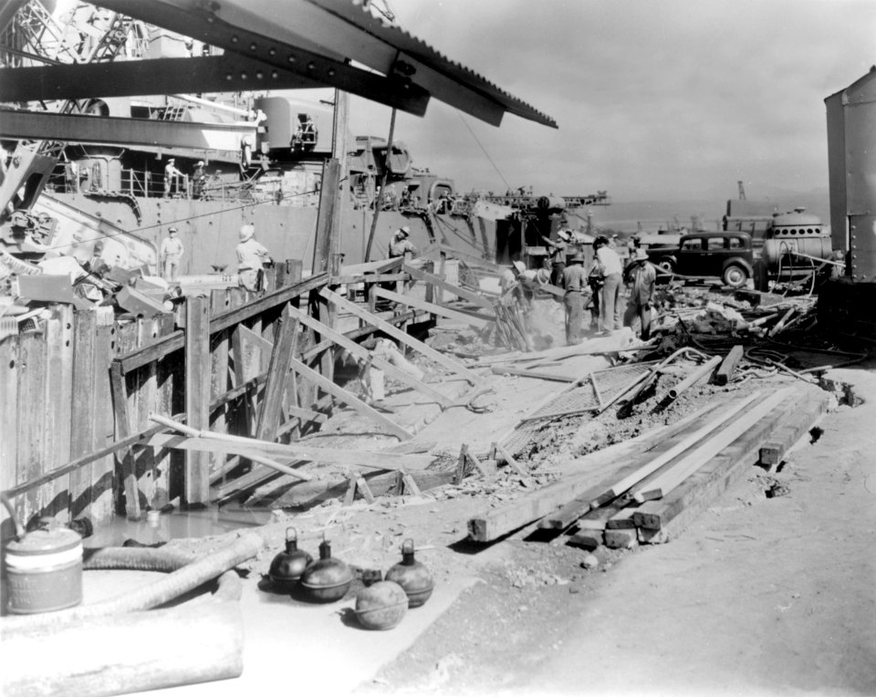 USS Helena (CL-50) at damaged 1010 dock, Pearl Harbor, 7 December 1941 (NH 96665)