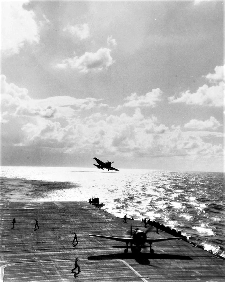 USS Hornet (CV-12) landing F6F Hellcat fighters during the Formosa Air Battle, 12 October 1944