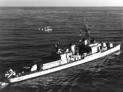 USS Hugh Purvis (DD-709) with a QH-50C DASH drone flying alongside on 15 December 1962