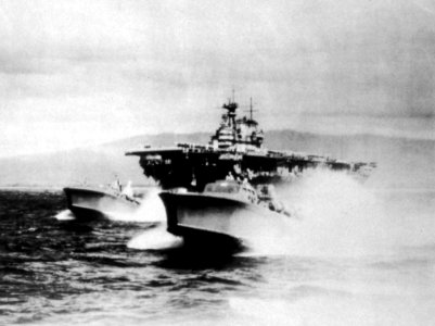 USS Hornet (CV-8) with PT boats off Pearl Harbor 1942
