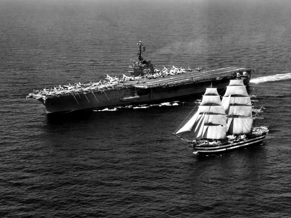 USS Independence (CVA-62) underway with sailing ship Amerigo Vespucci in the Mediterranean Sea, 12 July 1962 (USN 1061619)