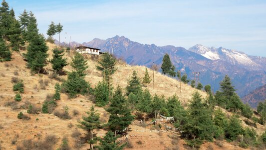 Bhutan hill house mountain photo