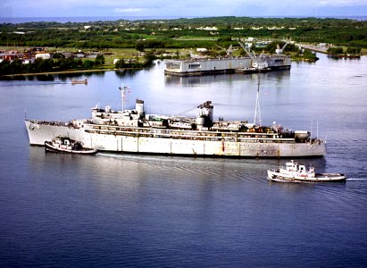 USS Jason (AR-8) with tugs at Apra harbor 1985