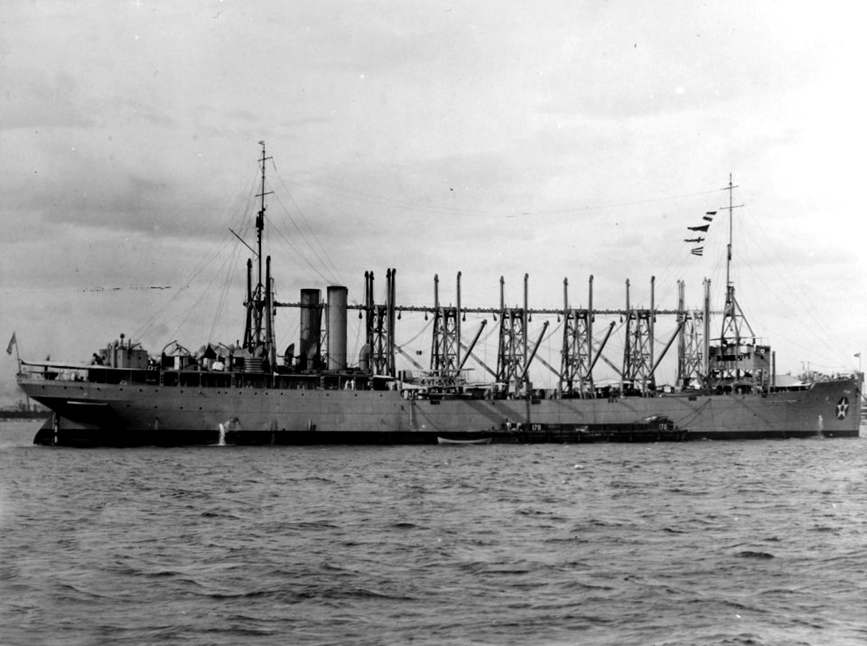 USS Jason (AC-12) with a Martin SC-2 aircraft on deck, in the 1920s (NH 52197)
