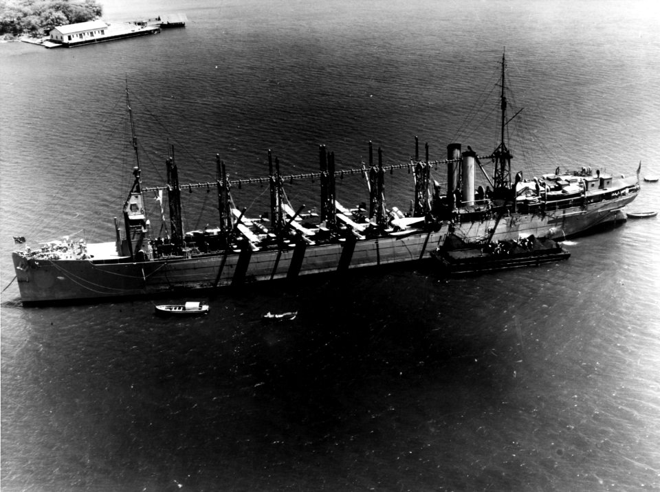 USS Jason (AV-2) coaling from a barge at Pearl Harbor, Territory of Hawaii, on 29 April 1932 (80-G-410001)