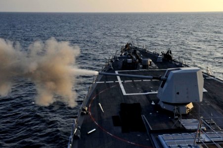 USS Jason Dunham fires its MK 45 5-inch gun. (8282018284)