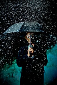 Raining umbrella mask photo