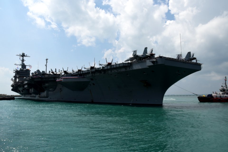 USS John C. Stennis arrives at Changi Naval Base in Singapore for a visit. (26522357055)