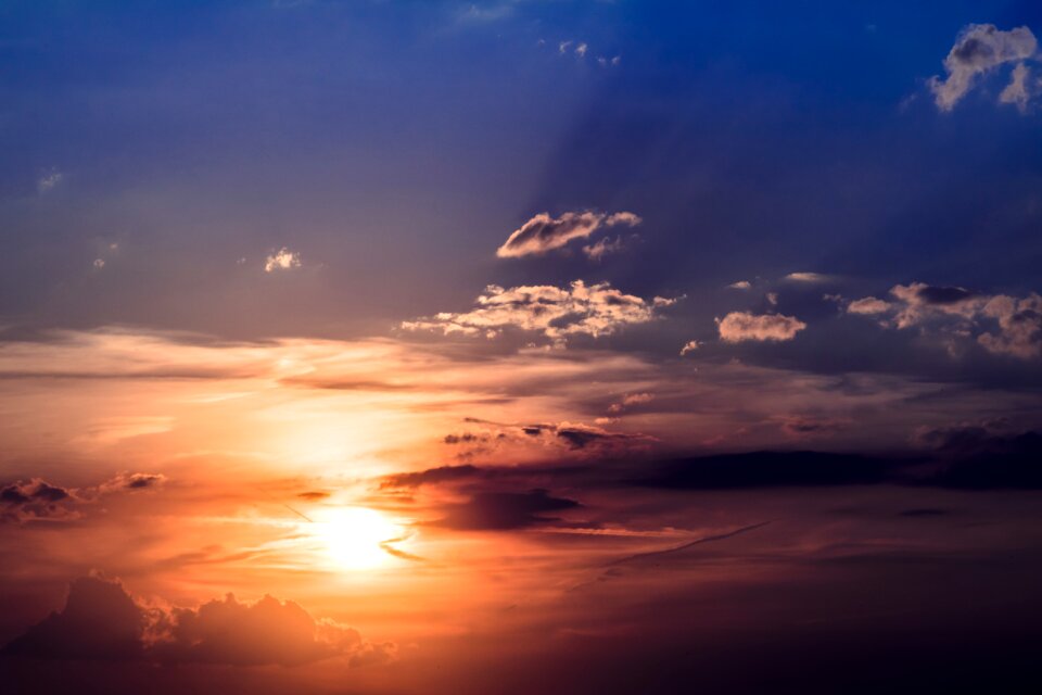 Setting sun clouds evening sky
