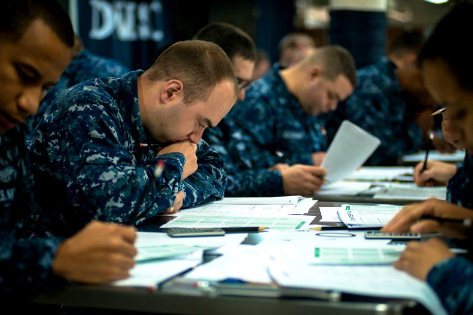 USS John C. Stennis Sailors take Navy-wide advancement exam 150903-N-DA737-030