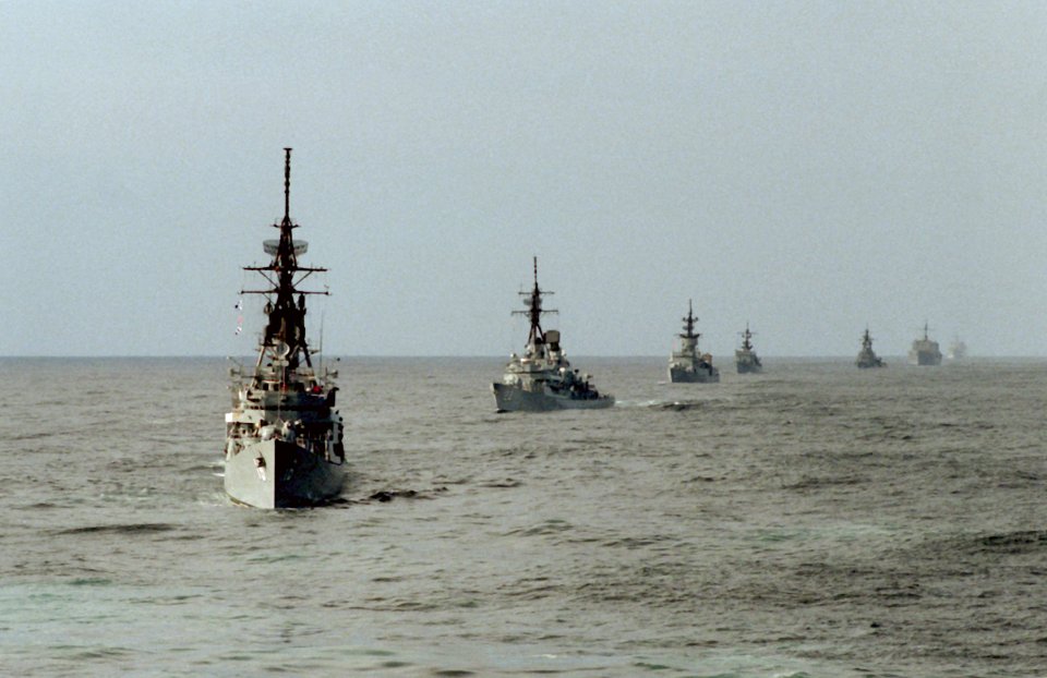 USS Joseph Strauss (DDG-16) leads a line of ships