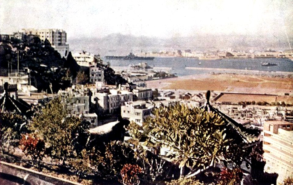 USS Kearsarge (CVA-33) at anchor in Hong Kong c1956