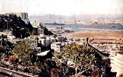 USS Kearsarge (CVA-33) at anchor in Hong Kong c1956
