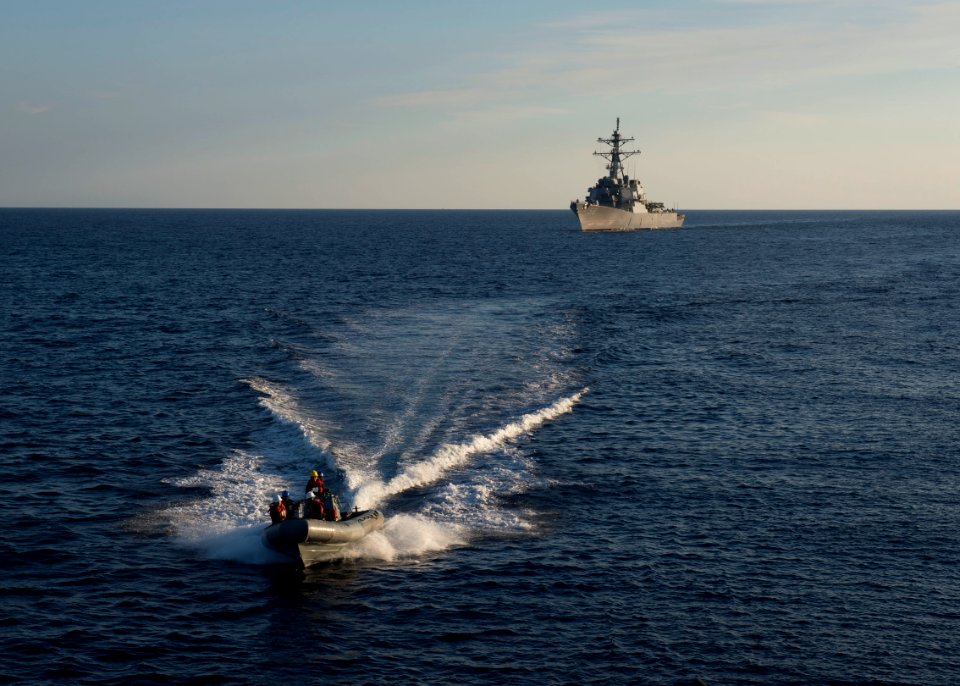 USS Laboon, in background conducts a personnel transfer with USS Ross. (17026948379)