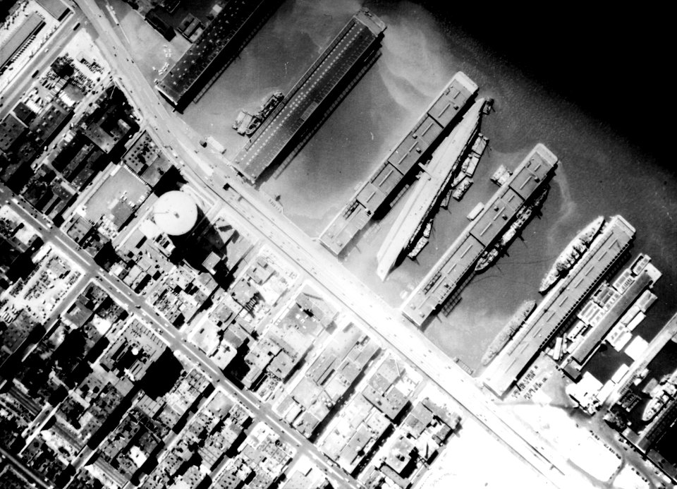 USS Lafayette (AP-53) under salvage at New York City's Pier 88, circa 1942-1943 (80-G-1971)