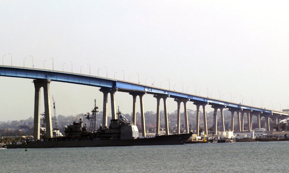 USS Lake Champlain (CG-57) passes under the Coronado Bay Bridge