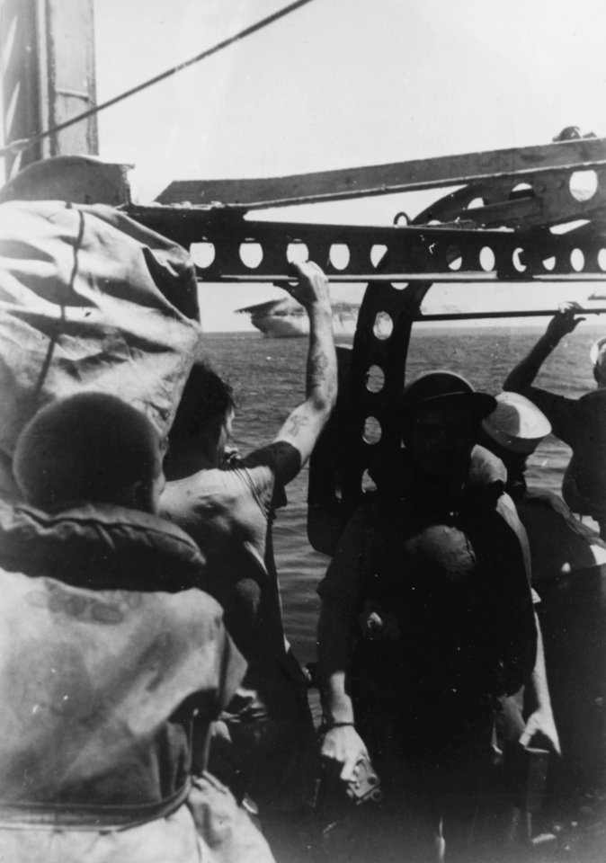 USS Langley (AV-3) being abandoned on 27 February 1942