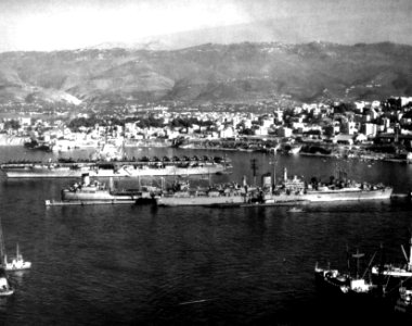 USS Lake Champlain (CVA-39) and USS Des Moines (CA-134) at Beirut, Lebanon, in October 1955